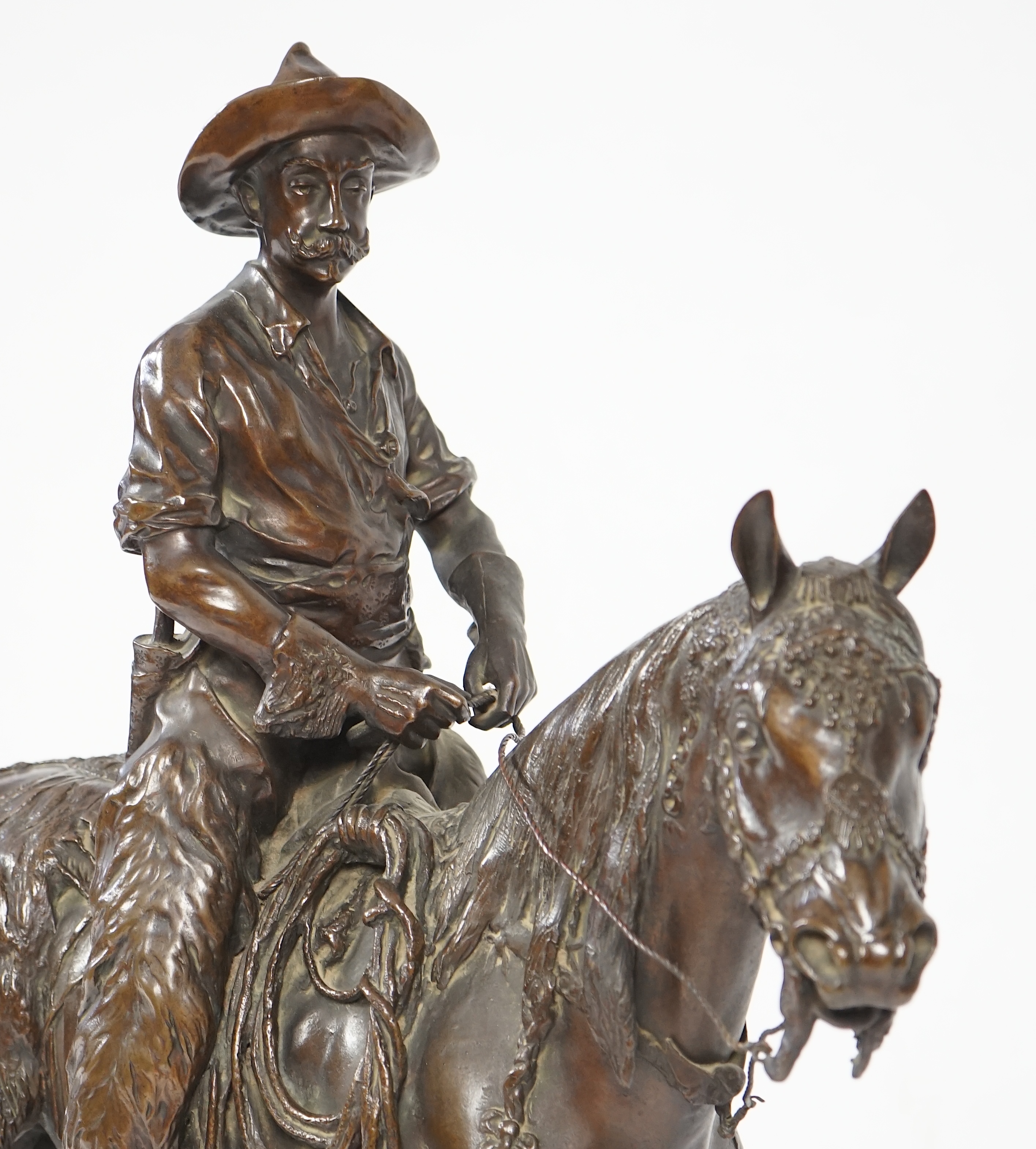 Walter Winans (St. Petersburg, 1852-Parsloe Park, Essex, 1920), a cast bronze of the artist, as a cowboy, riding the Arab stallion Skowronek, 50cm wide, 66cm high, overall 79.5cm high